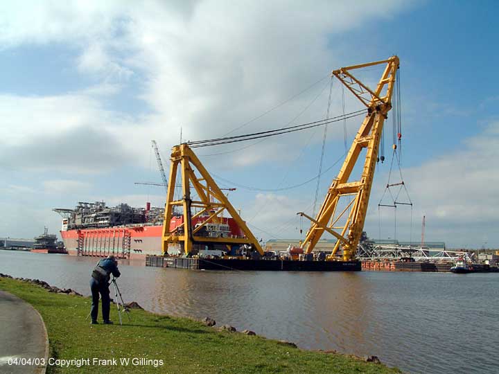 Asian Hercules II and the Bonga on the River Tyne. Photographer ready to capture image.