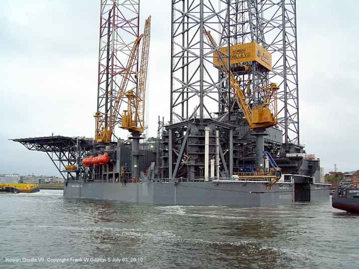 The massive Rowan Gorilla VII oil rig drilling platform upgraded, prepares to leave the river Tyne UK 5 July 2003