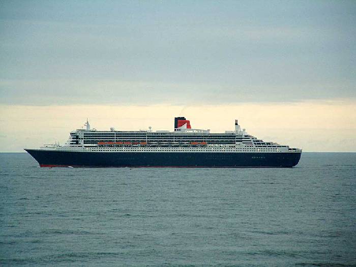 Queen Mary 2 passing King Edwards Bay Tynemouth and heading north to Edinburgh. 12 july 2004